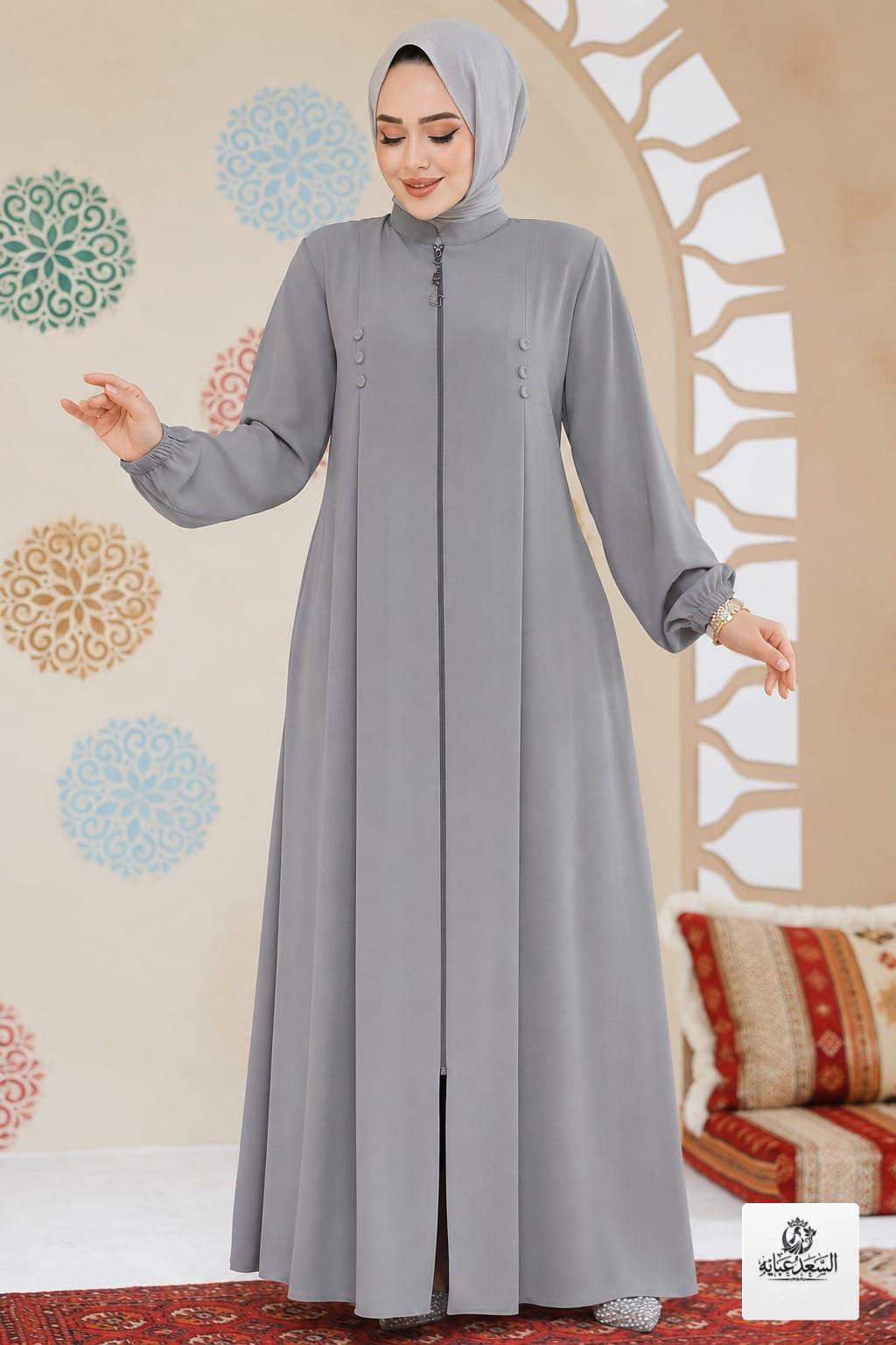 Elegant gray zipped abaya by alsaadabaya featuring long sleeves and a high neck.