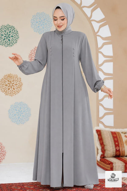 Elegant gray zipped abaya by alsaadabaya featuring long sleeves and a high neck.